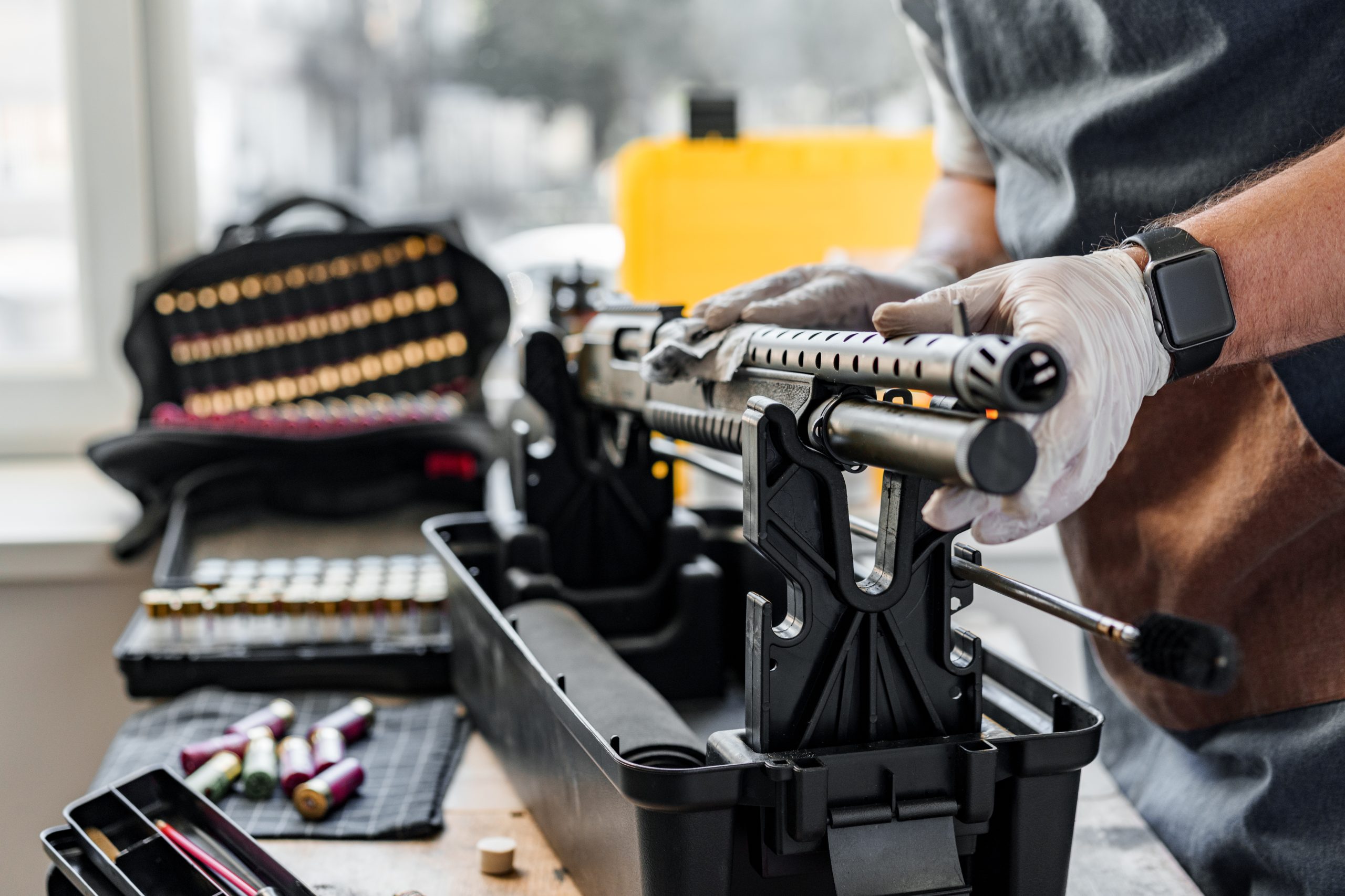 A man manufacturing a firearm